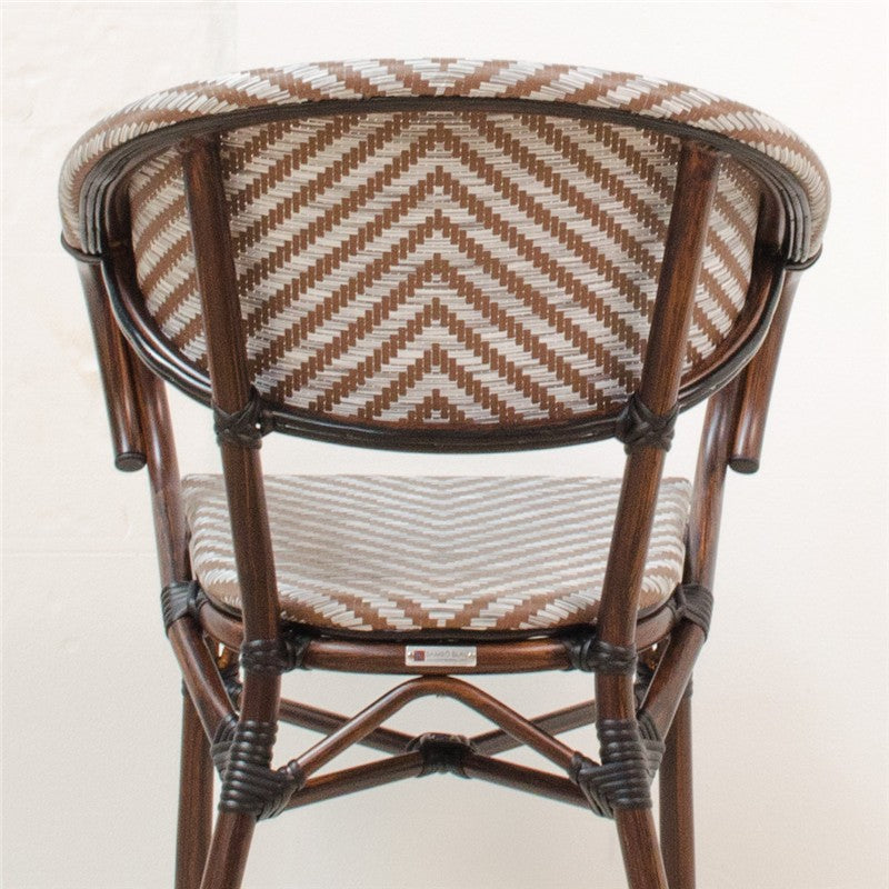 Silla con brazos de aluminio efecto ratán Young