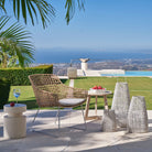 Taburete redondo de exterior de fibra blanca Capri