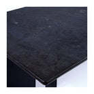 Mesa de comedor de piedra oscura y metal negro Chenini