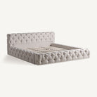 Cama tapizada beige Alcaufar