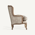 Sillón colonial de madera de mango y tapizado beige Savoca