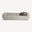Sofá tapizado beige con estructura de alerce Posada